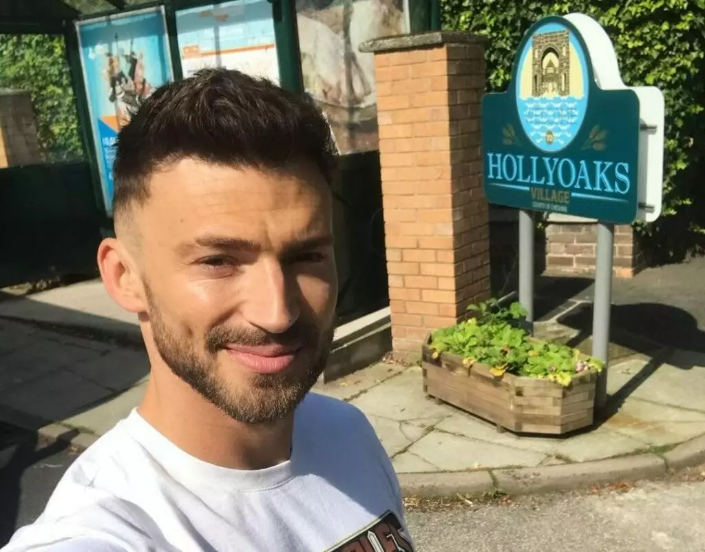 Jake Quickenden filming on the set of Hollyoaks